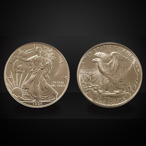 Front and Back of The 1994 Silver Eagle Concept Coin Against a Black Background