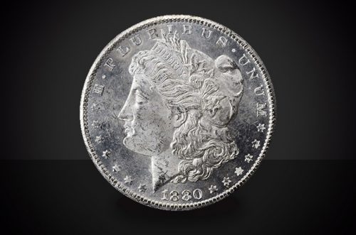 1880 CC Morgan Dollar Select BU Coin Against a Black Background