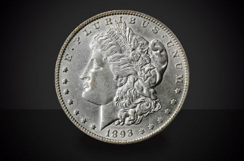 1893 Morgan Dollar Choice Borderline Uncirculated Coin Against a Black Background