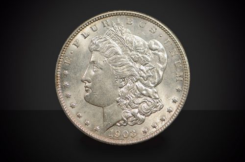 1903 O Morgan Dollar Select BU Coin Against a Black Background