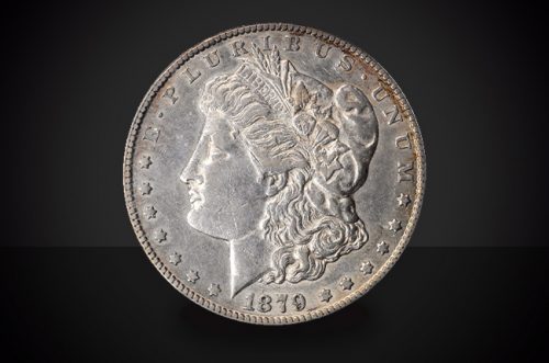 1879 O Morgan Dollar Choice AU/BU Coin Against a Black Background