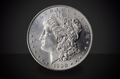 1900 S Morgan Dollar Select BU Coin Against a Black Background