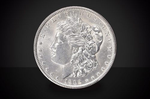 1902 S Morgan Dollar Choice Borderline Uncirculated Coin Against a Black Background