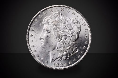1882 O/O Error Variety Morgan Dollar Choice Borderline Coin Against a Black Background