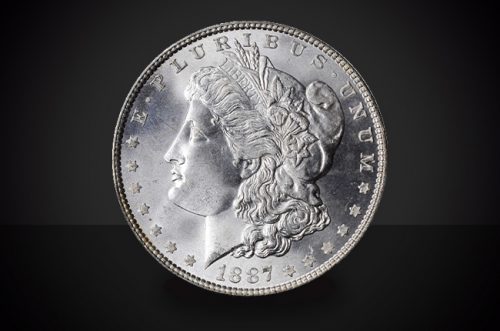 1887 S Morgan Dollar Select BU Against a Black Background