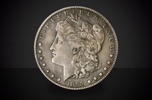1895 S Morgan Dollar Choice Circulated Coin Against a Black Background