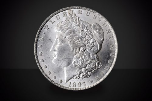 1897 S Morgan Dollar Choice Borderline Uncirculated Coin Against a Black Background